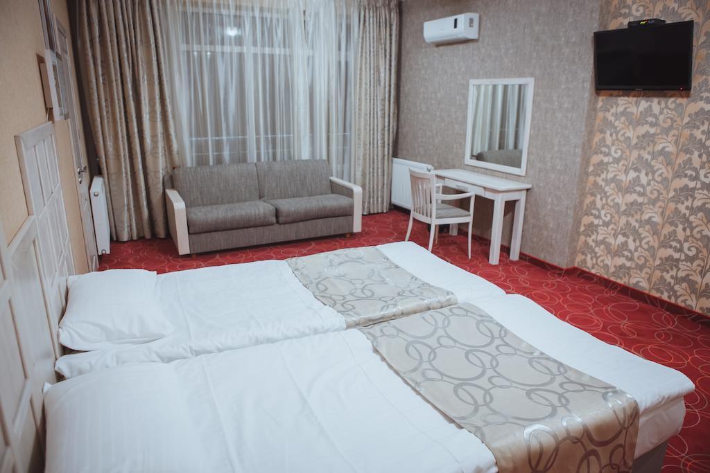 Hotel Magnum Berehowe Zimmer foto